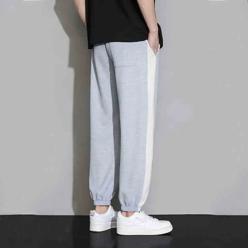 Korean Autumn New Fashion Casual Sports Pants Men Color Blocking Printing Pockets Patchwork Drawstring Fleece Straight Trousers
