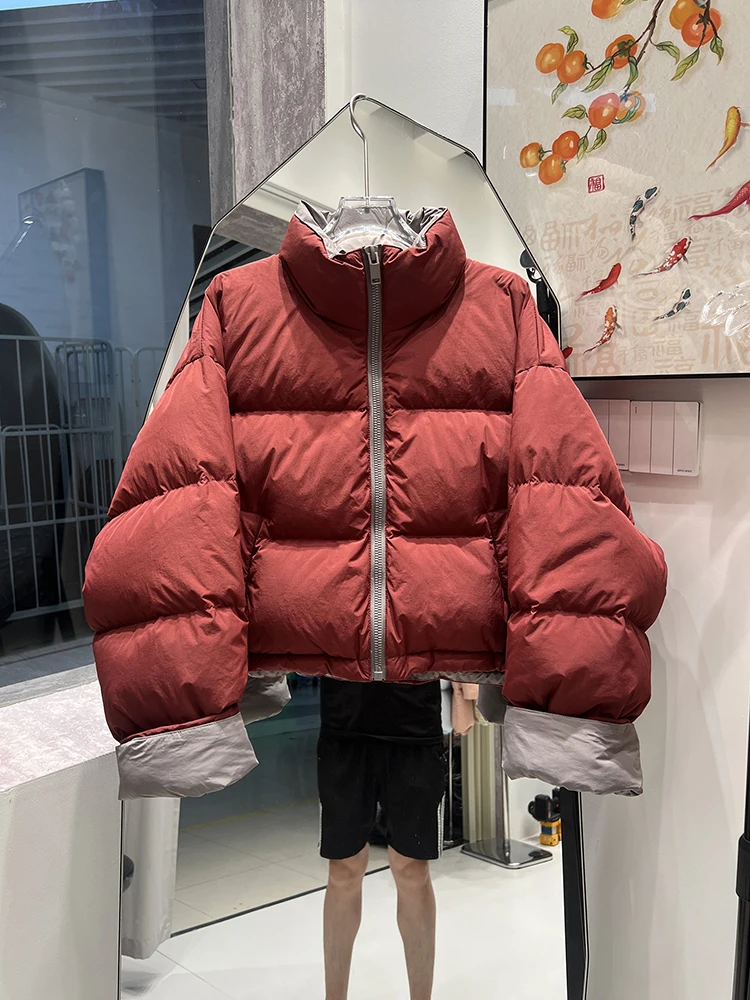 2025 Nuovo piumino corto invernale da donna edizione coreana moda colletto rialzato giacca da pane spessa allentata in colore a contrasto