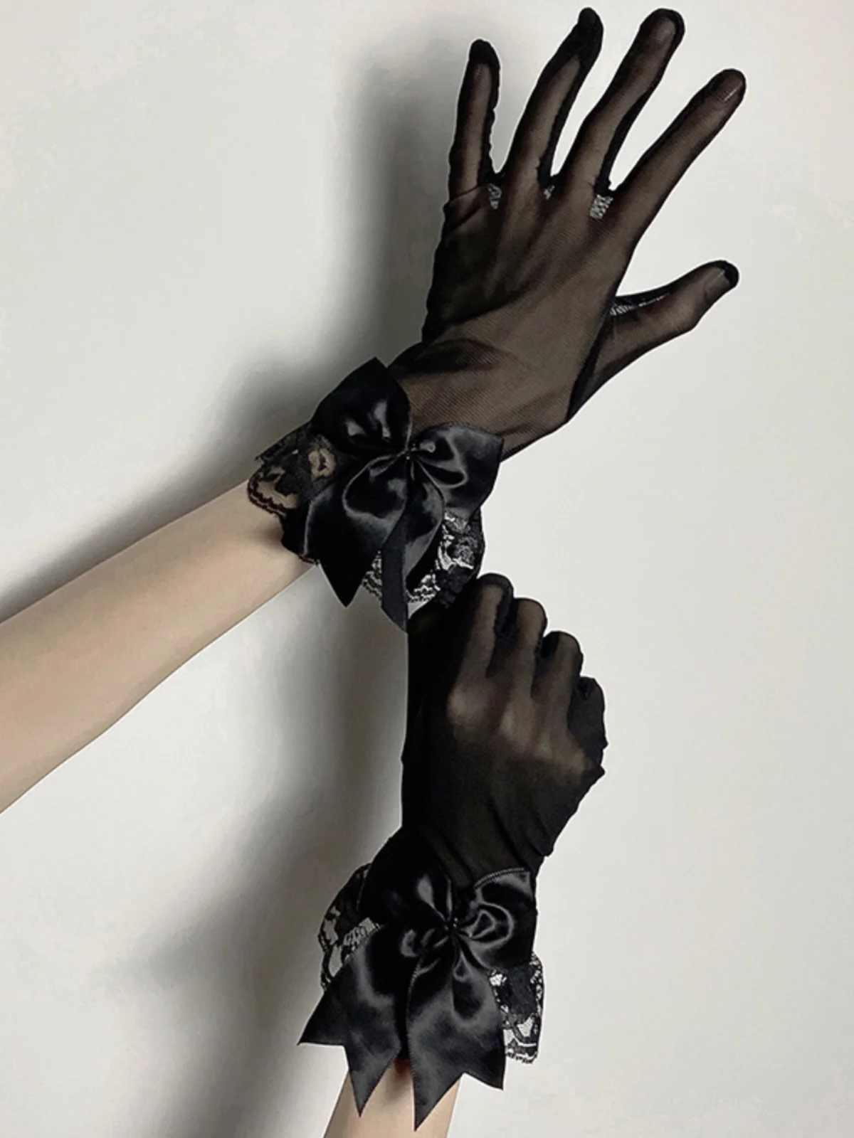 Gants gothiques Lolita avec nœuds en dentelle noire pour femmes
