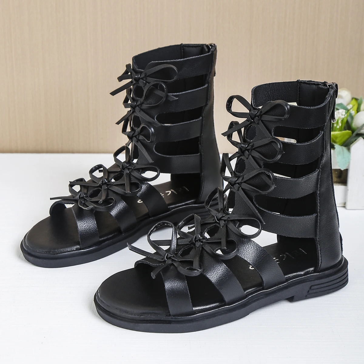 

Новые детские модные сандалии с бантом, высокие, в римском стиле, дышащие, для девочек, на мягкой подошве, летние.