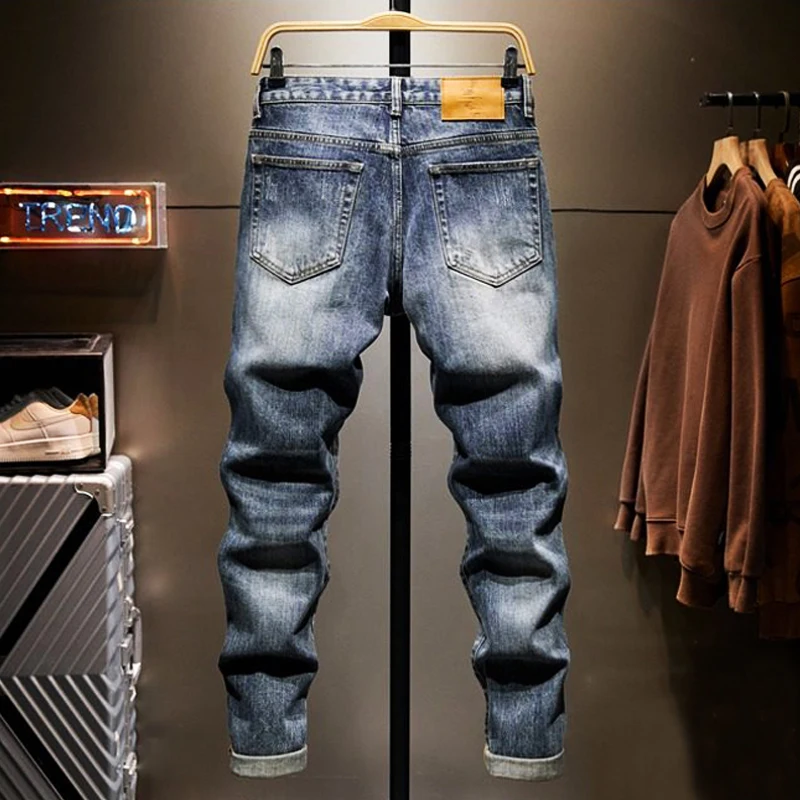 Fashionable new men's jeans with scratches, nostalgic elasticity, slim fit, retro washed blue jeans, designer pants, Y2K
