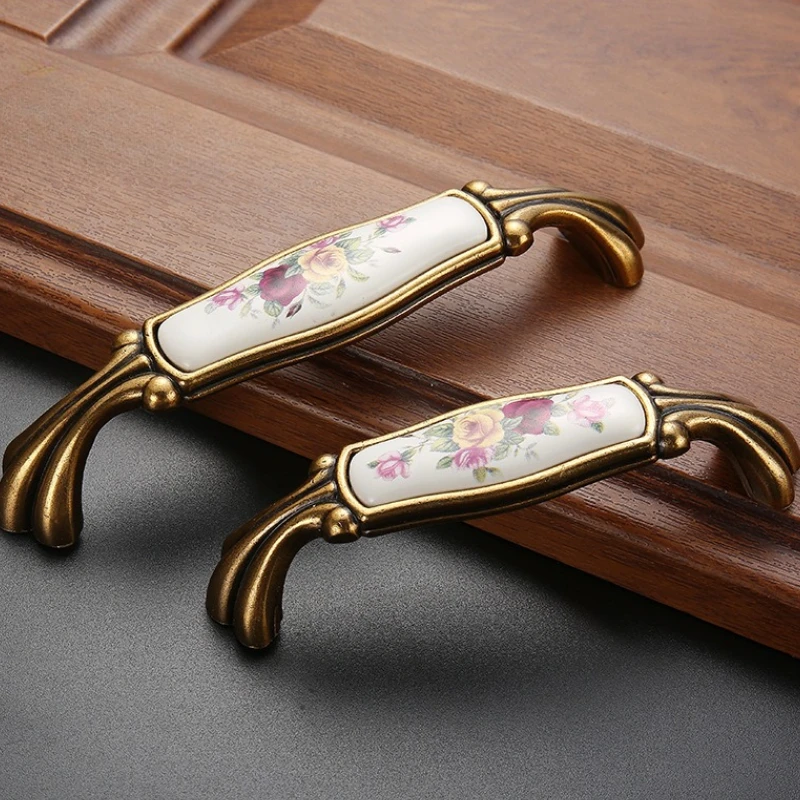 Perillas de cajón, manija de puerta de armario, herrajes para muebles europeos, manijas de gabinete blancas de cerámica de bronce antiguo de aleación de Zinc