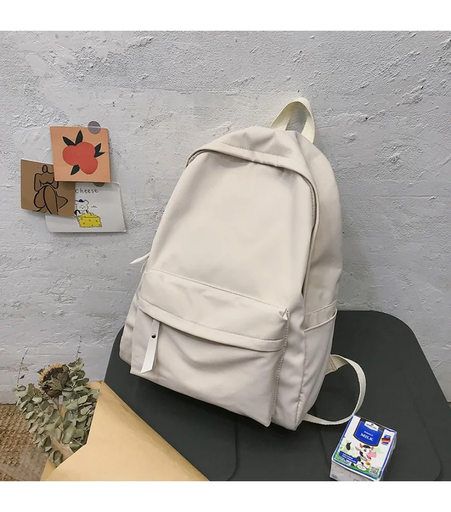 Solid color student junior high school Mori ins backpack lightweight schoolbag Korean version simple and versatile
