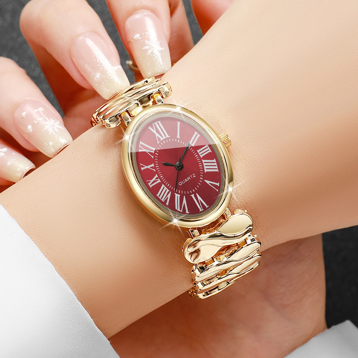 Fashion Women Golden Wrist Watch Oval Red Roman Numeral Dial Wave Metal Band Ladies Quartz Watches Relogio Feminino (Without Box
