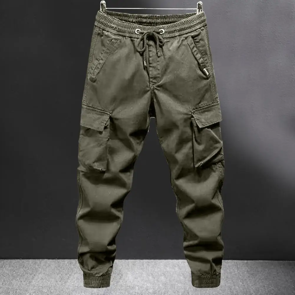 Celana Kargo Wanita dengan Banyak Saku Pinggang Elastis Tali Pergelangan Kaki Celana Panjang Luar Ruangan Pria Longgar Ukuran Besar untuk Perjalanan Berkemah dan Mendaki