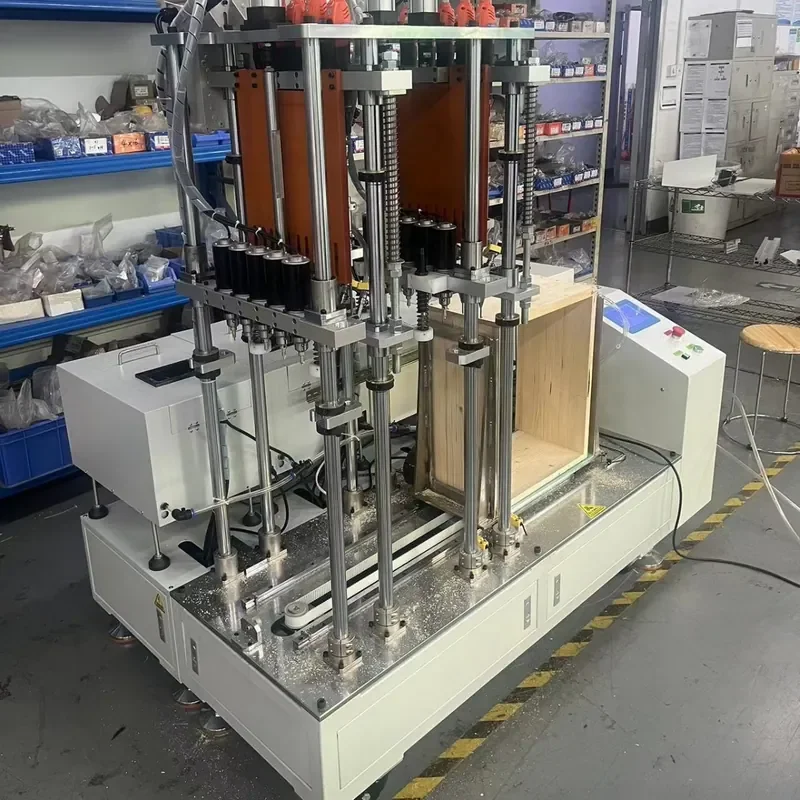 

Fully automatic multi-head drilling and screwing machine, wooden box furniture punching and screwing are completed at the