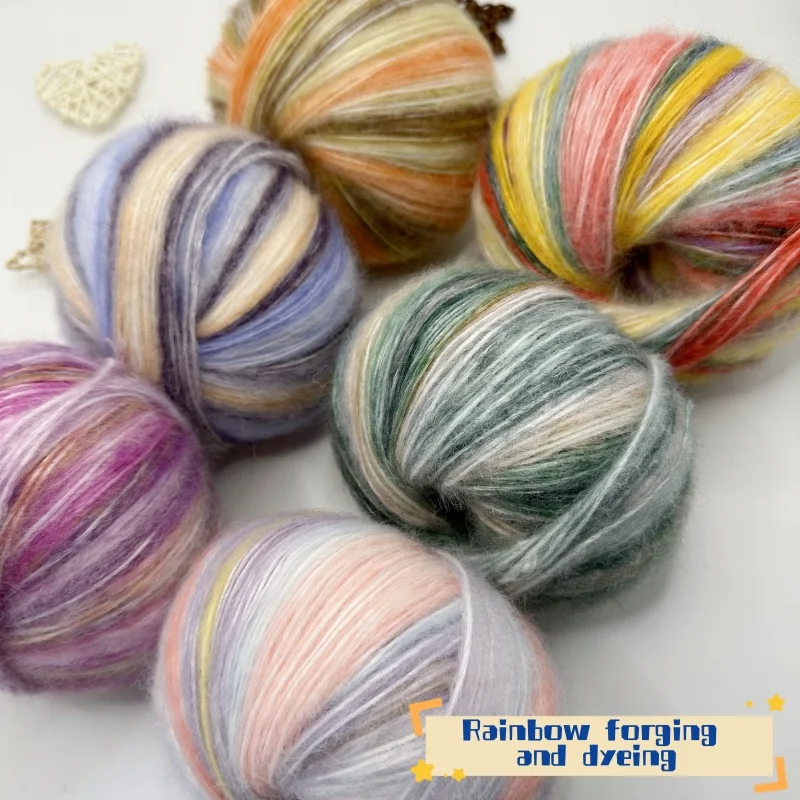 The yarn is a gradient wool-mohair blend with a rainbow segment-dyed medium weight. Each ball weighs 100 grams and is 350 meters