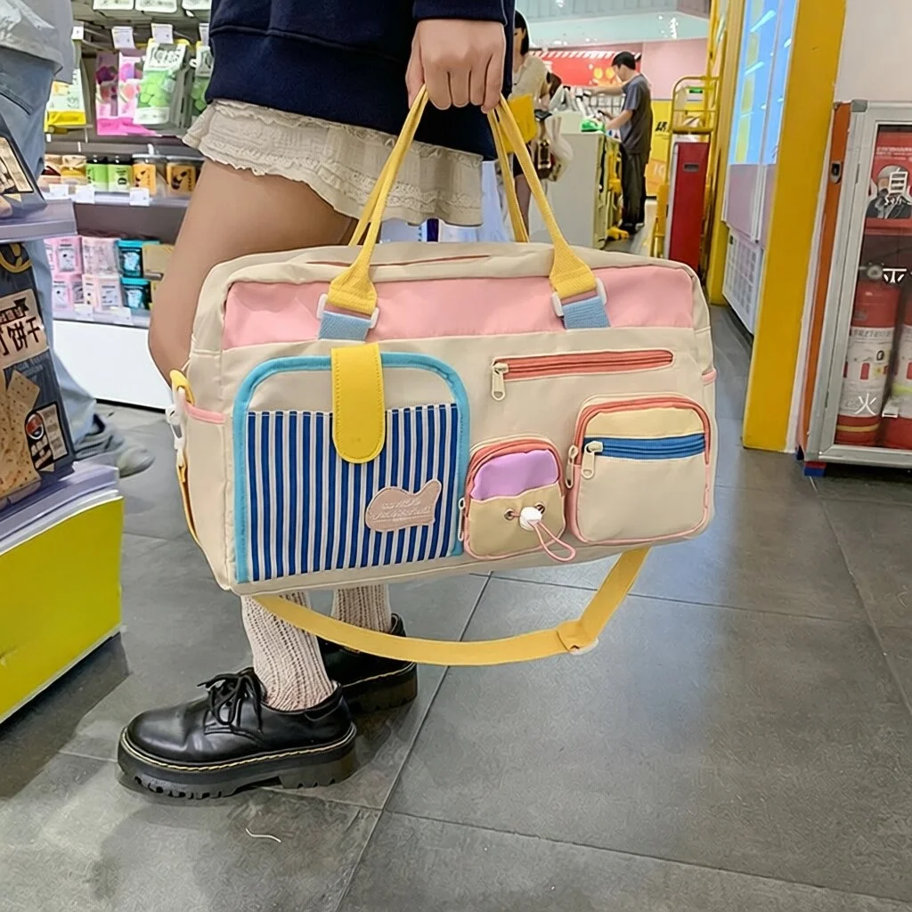 新しいカラーブロック大容量トラベルバッグ多機能フィットネスバッグ女性のクロスボディハンドヘルド屋外収納バッグ