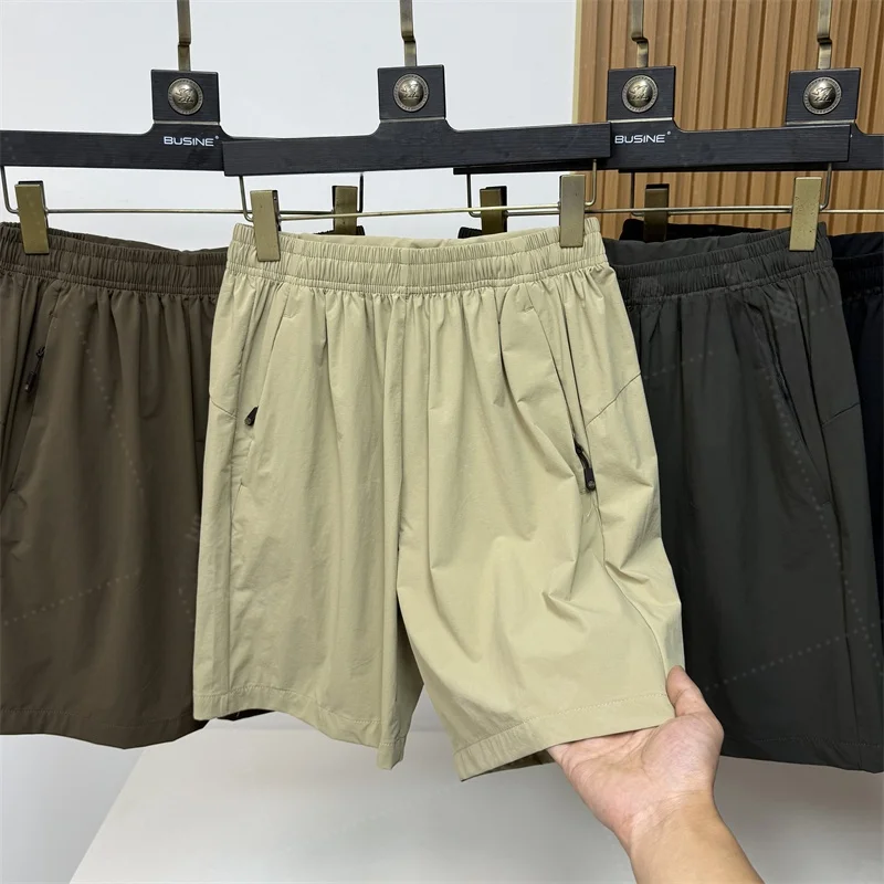 

Мужские шорты больших размеров из ледяного шелка, быстросохнущие, эластичные, тонкие, длиной до колена, повседневные, свободные, летние, дышащие, молодежные, модные, спортивные, прямого кроя.