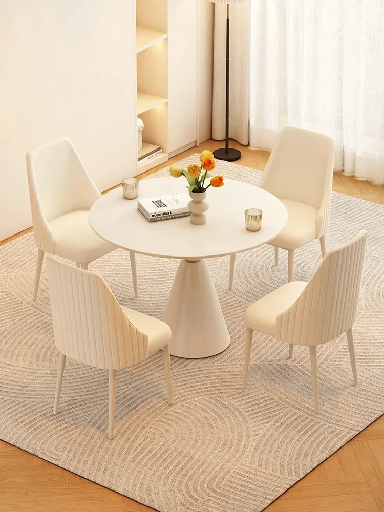 Cream style rock board dining table and chair combination, modern and simple circular small round table