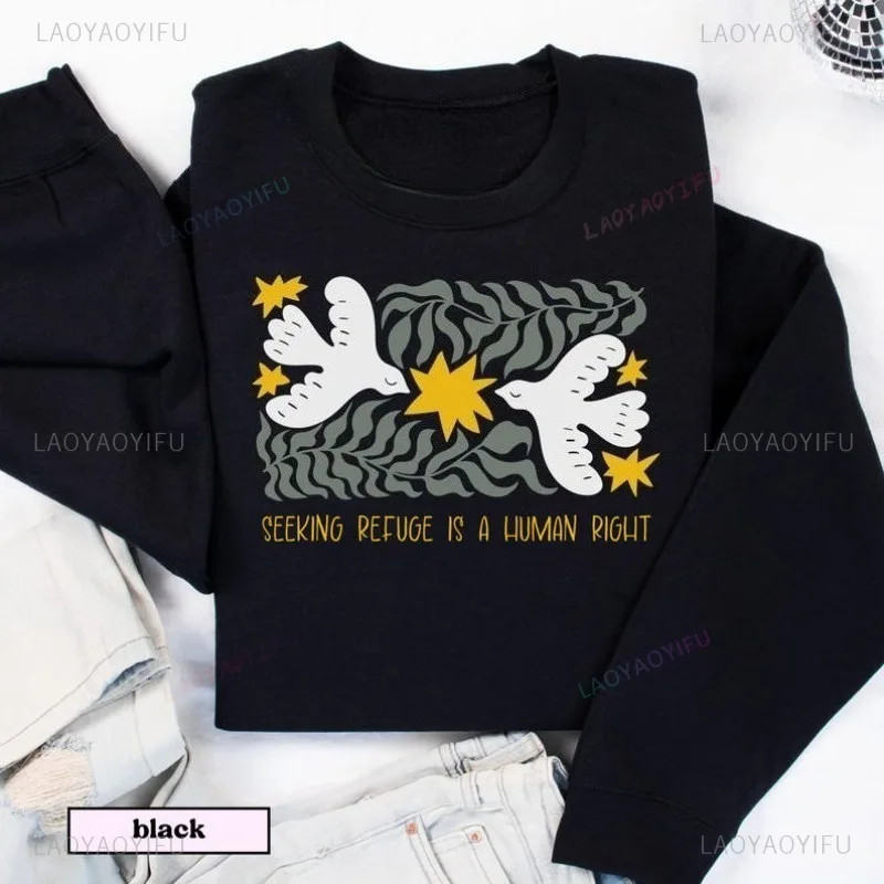 

Is A Human Right Christmas Sweatshirt with Doves and Stars Cozy Holiday Hoodie for Advocates of Peace Human Rights