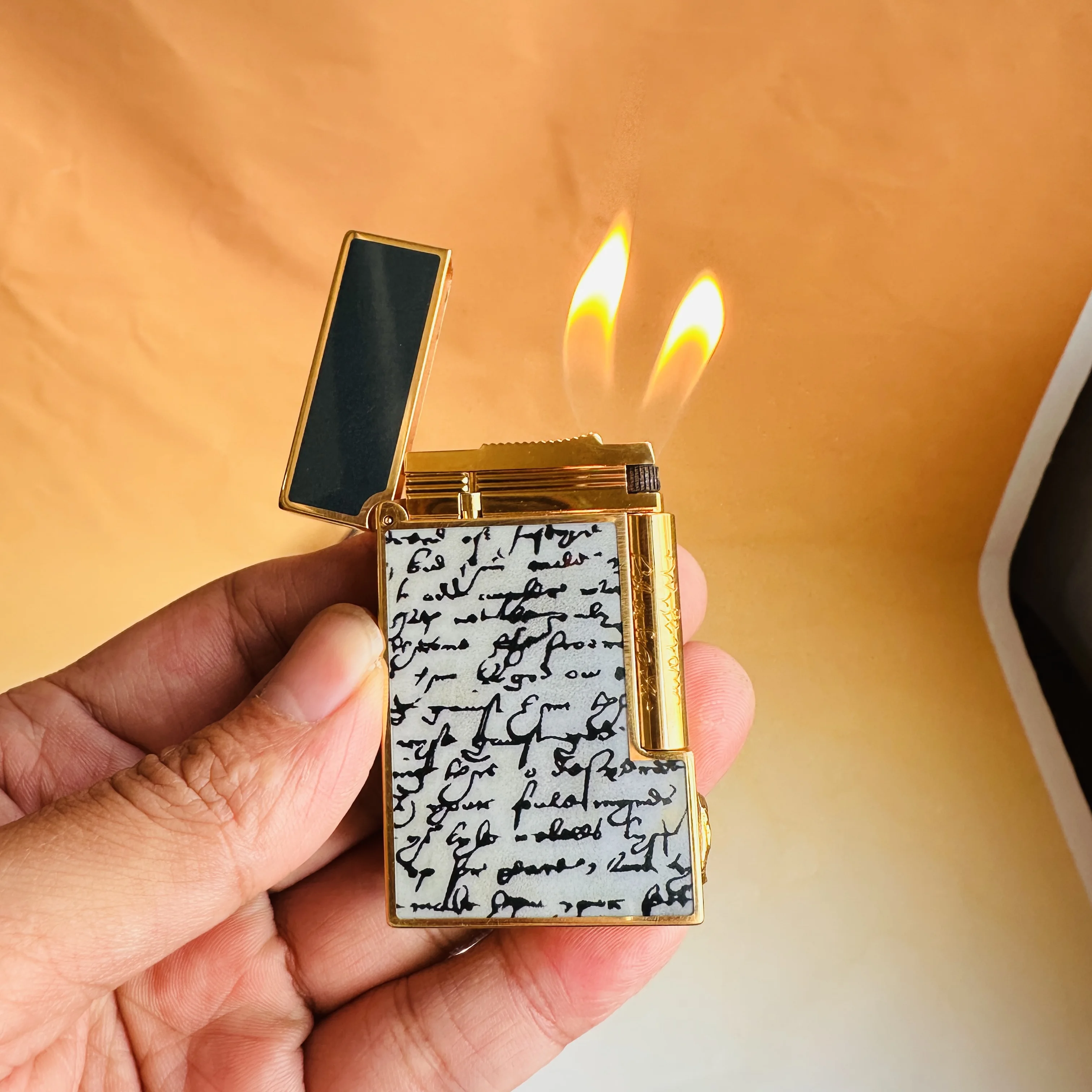 

Custom-made lighter, top quality, made with extra-thick electroplated real gold, and includes a set of custom accessories.