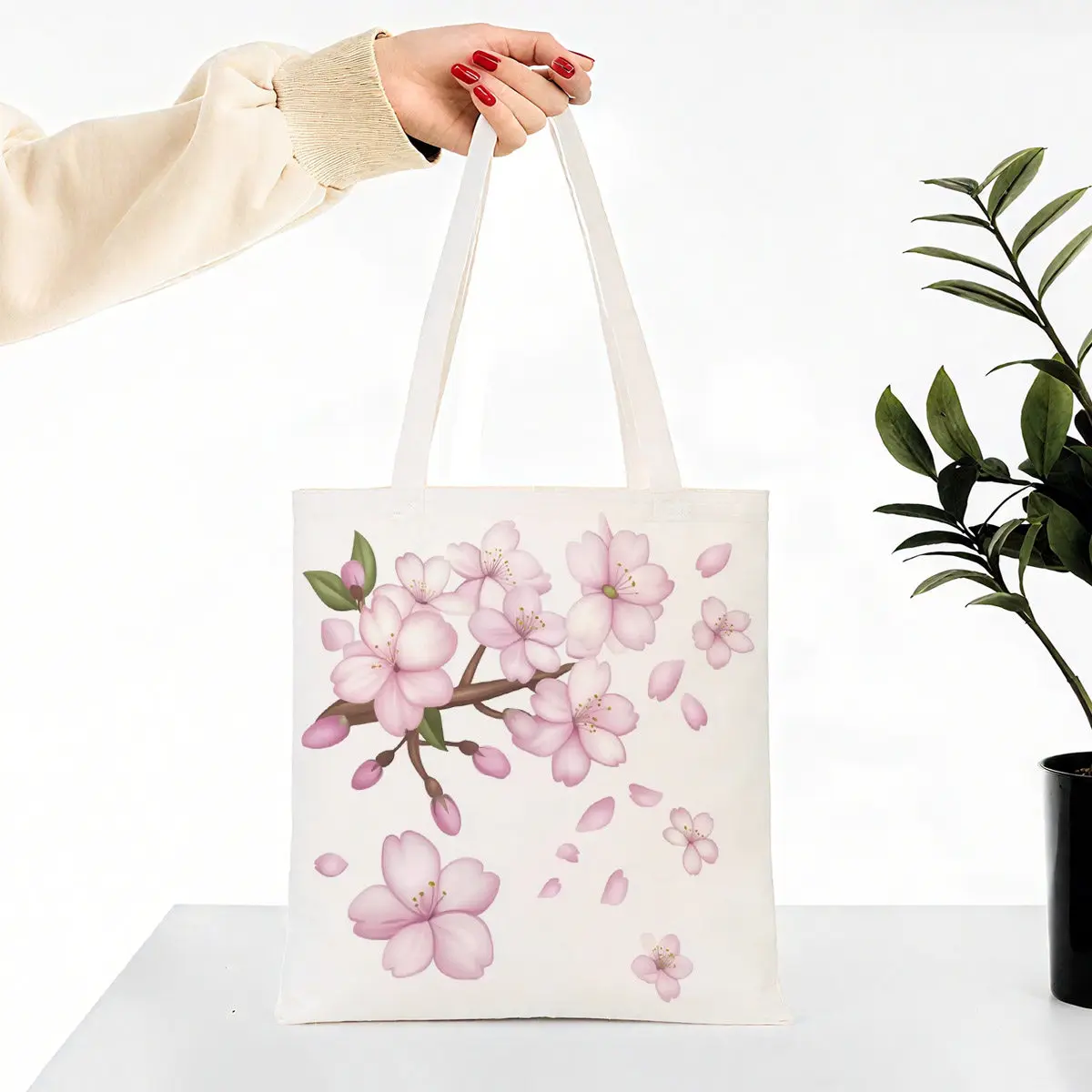 Bolso de mano de lona con estampado de ramas de cerezo, adecuado para uso diario, compras, escuela y viajes.