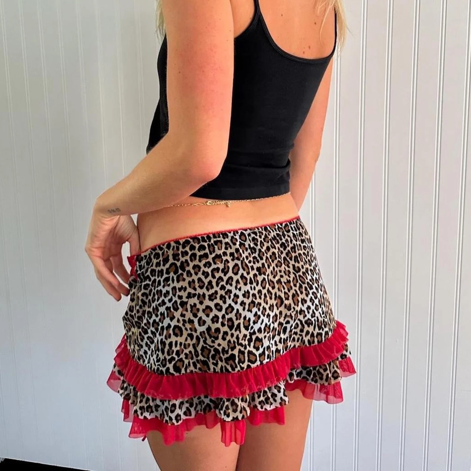 Mini falda corta para mujer Falda corta de moda con borde de encaje y volantes con estampado de leopardo de talle bajo