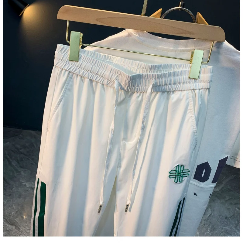 

2025 New Ice Silk Casual Pants for Men's Summer, Thin, Sports Trendy, Light Luxury, High End Embroidered Quick Drying Pants
