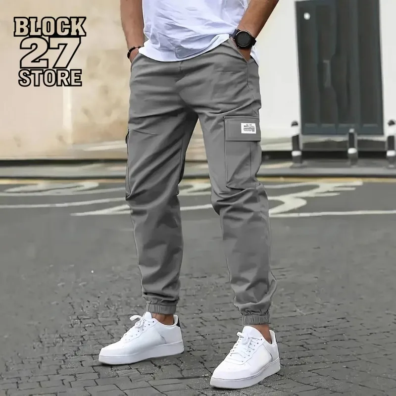 Harajuku السراويل البضائع الرجال الشارع الشهير الرباط جيب السراويل الأمريكية الرجعية فضفاضة تناسب السراويل الطويلة عارضة في الهواء الطلق موضة جديدة