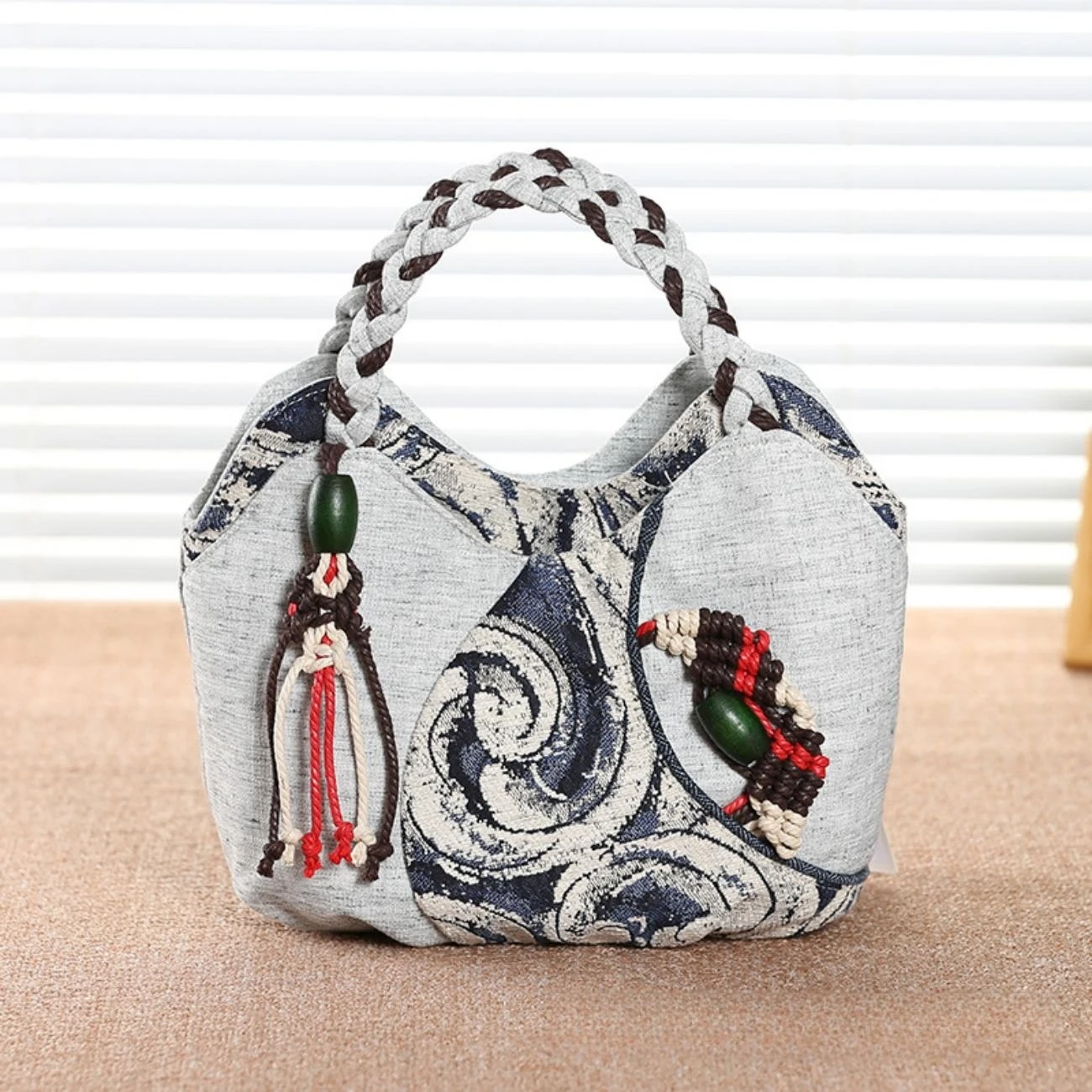 

Ethnic Style Versatile Multi layered Handheld Bag Women's Bag Cotton and Hemp Lightweight Literary Weaving Tassel Handheld Bag