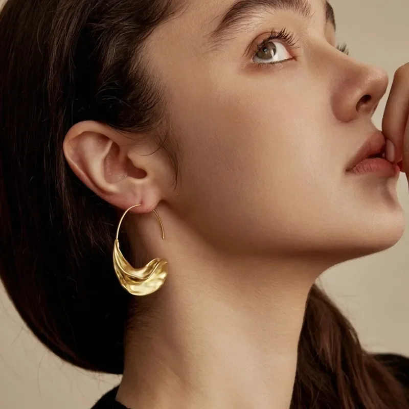 Neon clothes whirlpool earrings women's matte gold irregular European and American style earrings niche design sense
