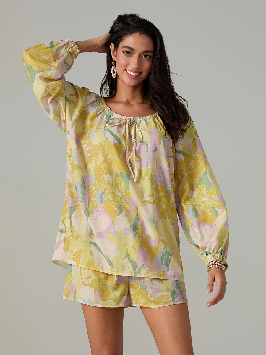 Elegant Floral Ensemble Stylish Long Sleeve Blouse with Tie-up Detail and Elastic Waist Shorts for a Chic Summer Look