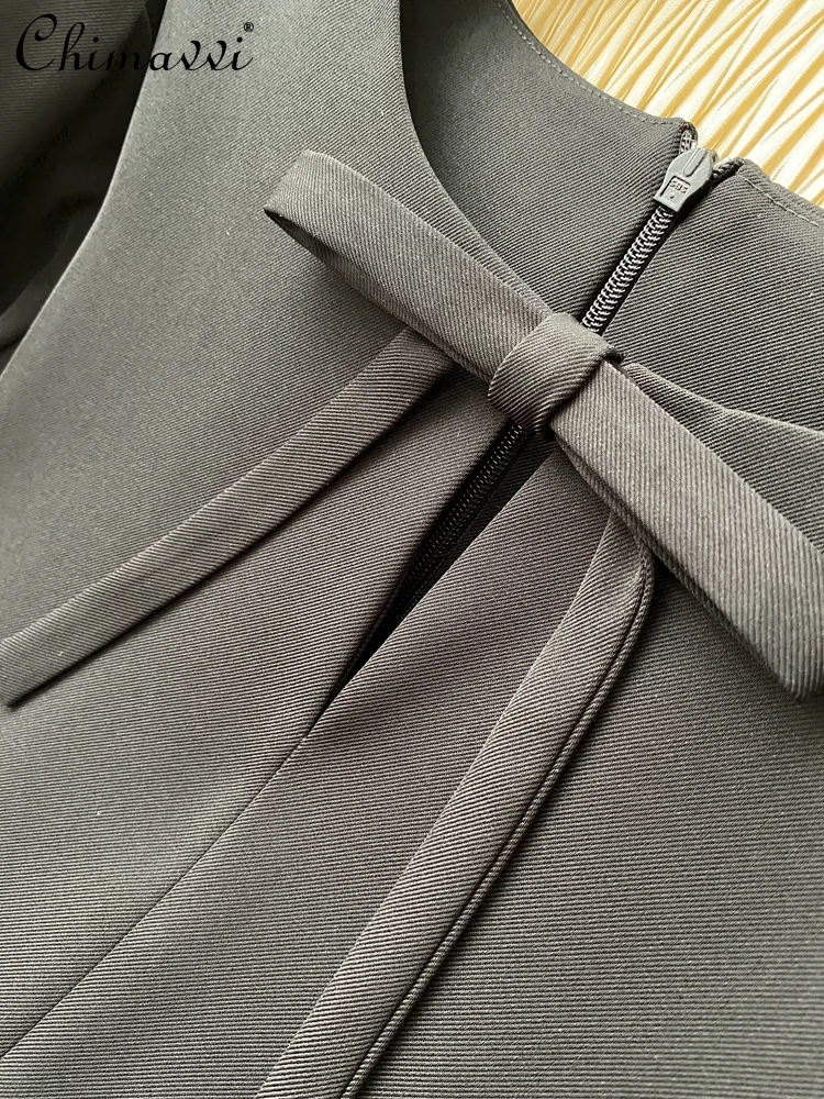 Station européenne été nouveau haut de gamme léger luxe célébrité tempérament nœud ample robe courte lourd paillettes fête robe droite