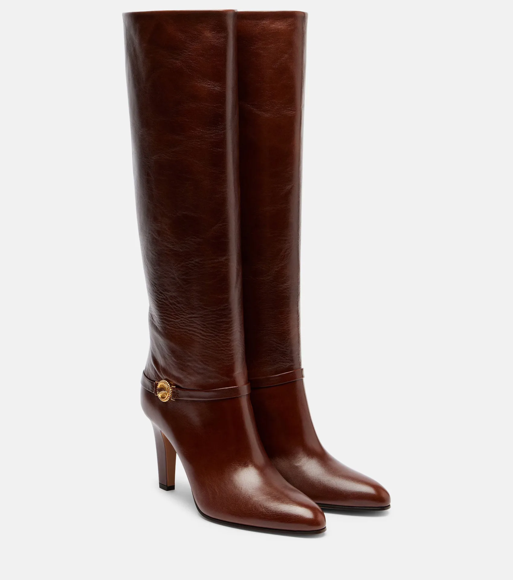 Women's Leather Knee-High Boots Gold Emblem Detail Stiletto Heel Sleek Elegant Design for Classic Casual Autumn Fashion Looks