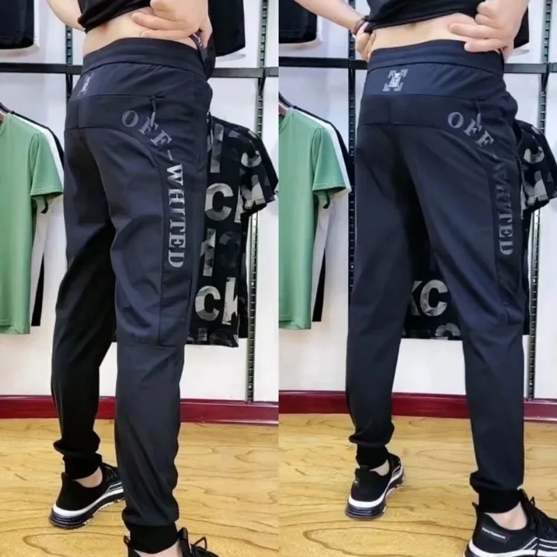 Elastic Force Men's Pants Spring Summer Leisure Sports Pants Male Shredded Milk Leggings Light Thin Splicing Pocket
