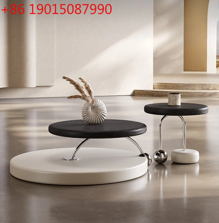 

Italian light luxury designer round coffee table combination Nordic modern cream style coffee table small apartment