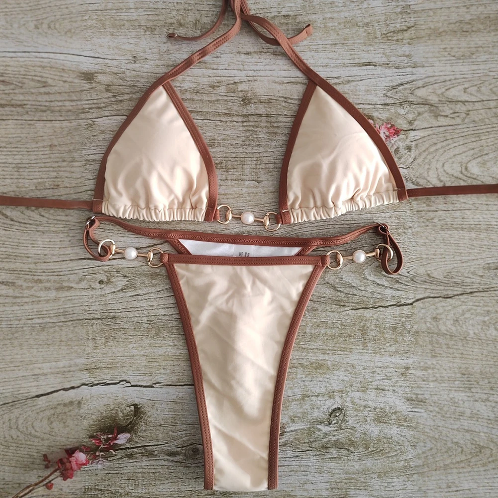 Unieke bikiniset voor dames met driehoekige top en modieuze metalen ringdetails, ideaal voor zomeravonturen