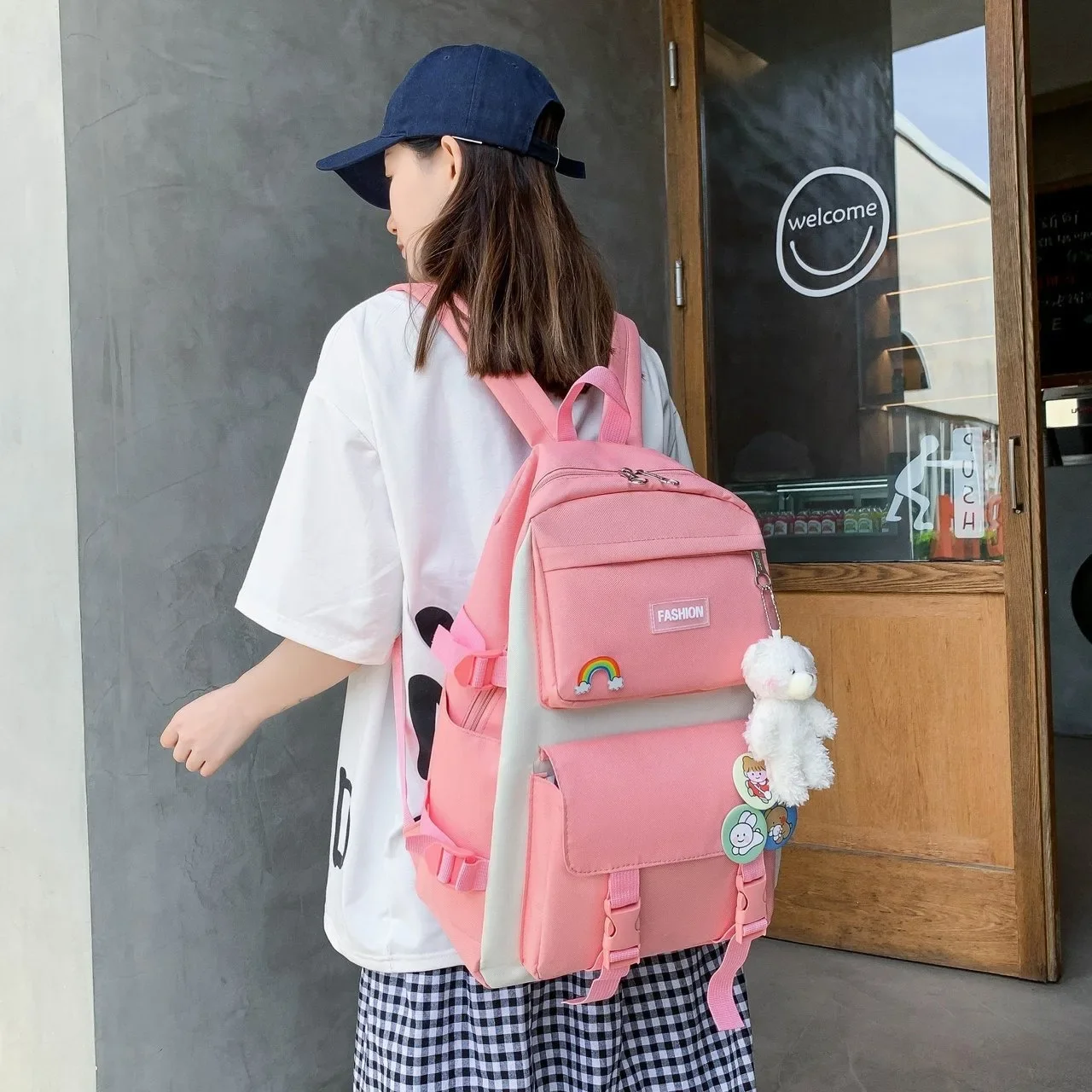 Conjunto de cuatro piezas de mochila de estudiante para mujer en versión coreana Campus de escuela secundaria de lona informal con gran capacidad