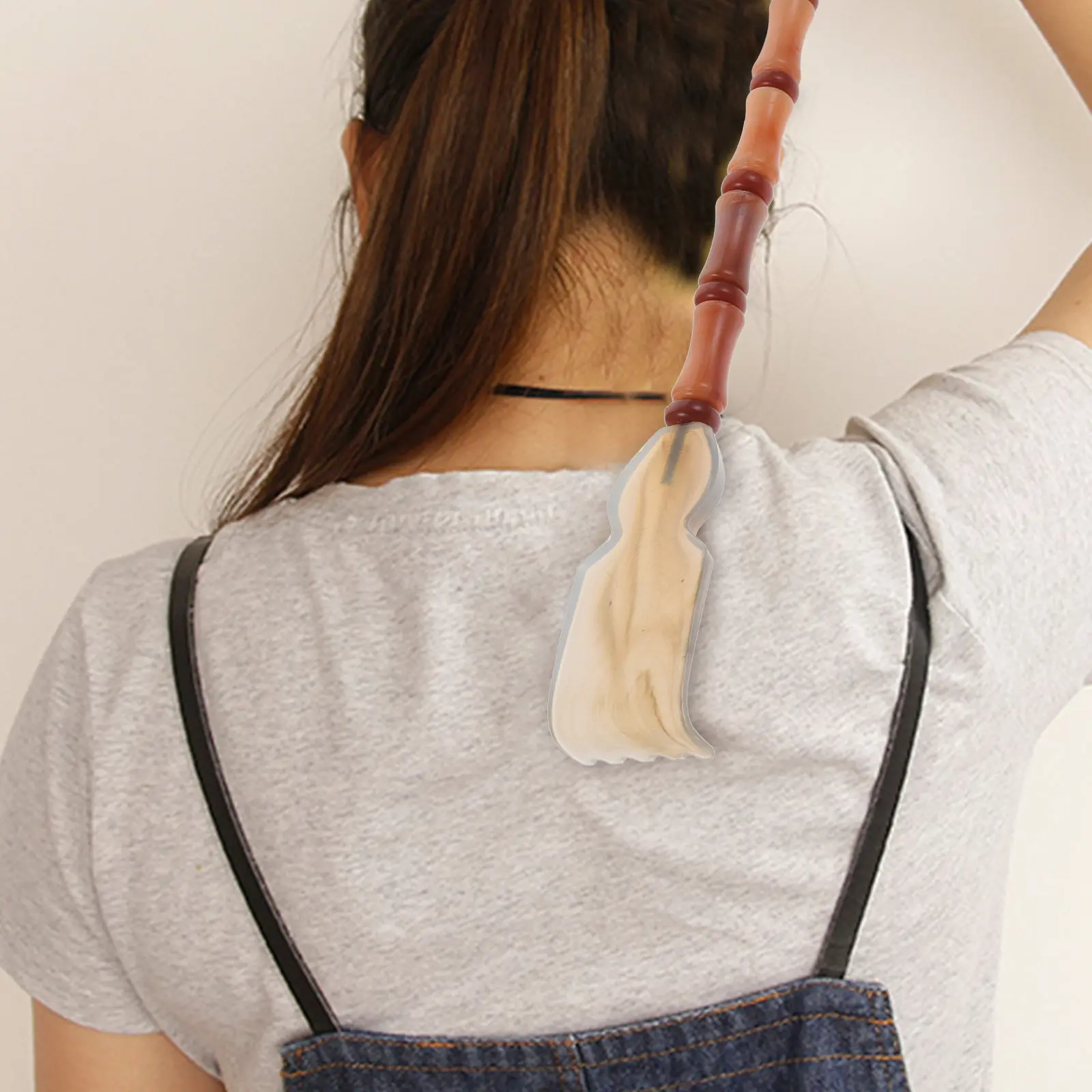 

Портативный массажер для спины из бычьего рога, эргономичной формы, для расслабления, идеально подходит для мужчин, женщин и пожилых людей.