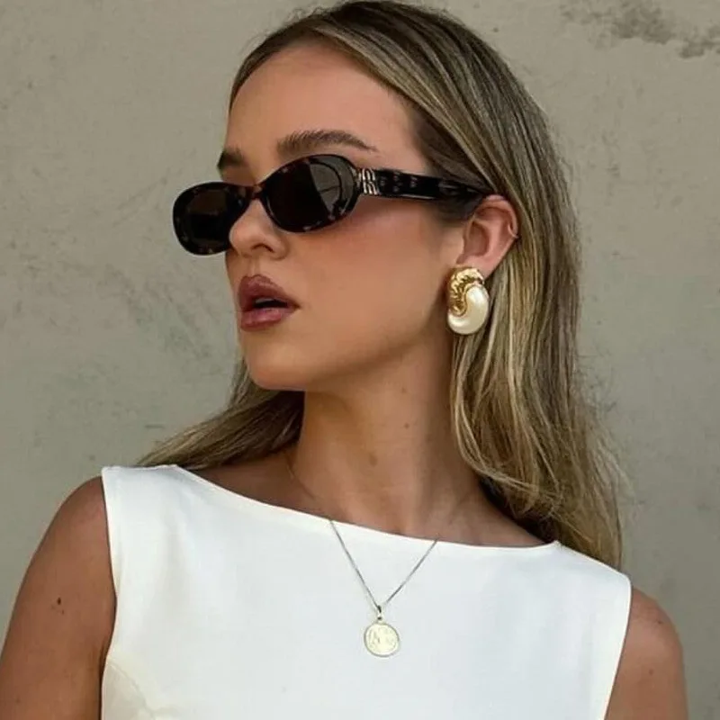 

New small frame cat's eye women's fashion versatile personalized sunglasses European and American spice girl style sunglasses