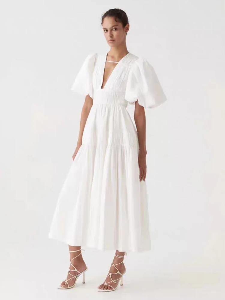 2025 verano mujer sexy escote en V profundo manga de burbuja plisado vestido de cintura alta moda dobladillo suelto falda pommel