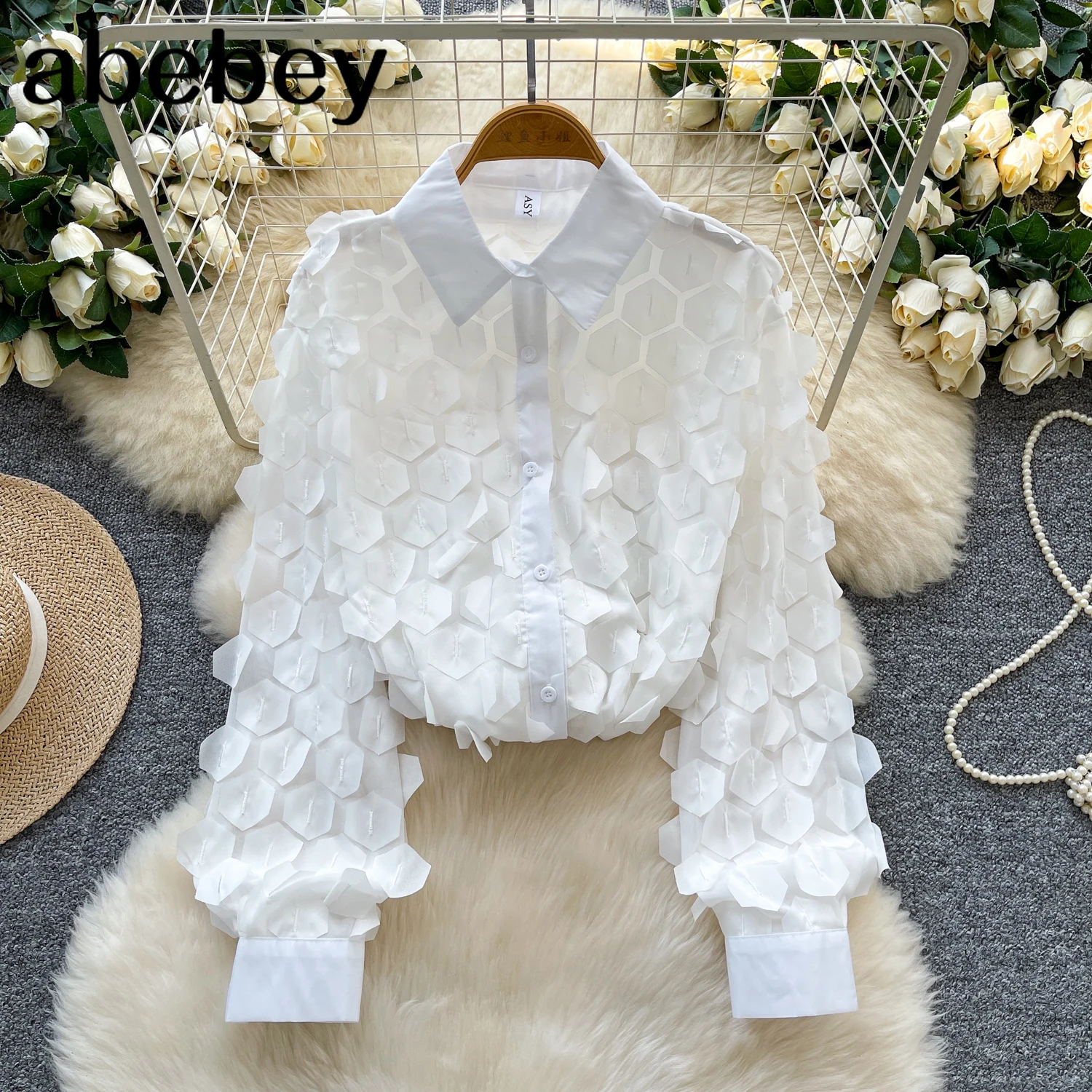 เสื้อเชิ้ตผู้หญิงทรงหลวม ดีไซน์ผ้าบางโปร่งลายปะติด สีพื้น กระดุมแถวเดียว เสื้อเบลาส์ แฟชั่นใหม่ ฤดูใบไม้ร่วง 2026