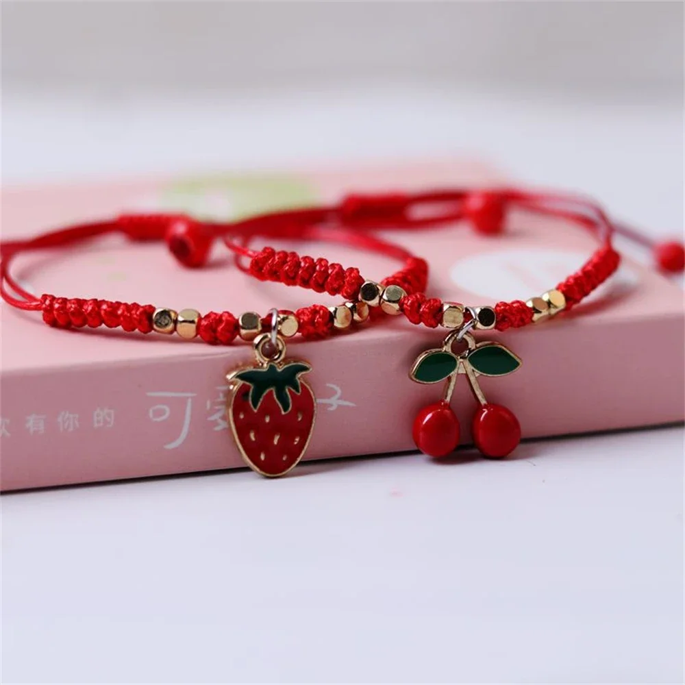 Pulseras de cereza y fresa tejidas a mano, joyería de amistad de cuerda roja bonita para niñas, accesorios colgantes de fruta dulce, regalos de moda