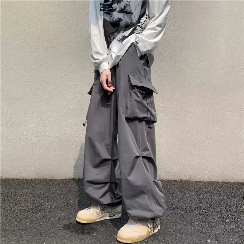 

2023 Streetwear Spring Harem Casual Pant Men Elastic Waist Solid Color Cargo Fallow Multi Pocket Loose Baggy Y2k Pants For Women