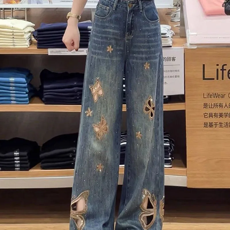 Nuevos pantalones vaqueros con mariposas bordadas caladas para mujer Primavera Verano nuevos pantalones vaqueros ajustados y ajustados de cintura alta a la moda para mujer