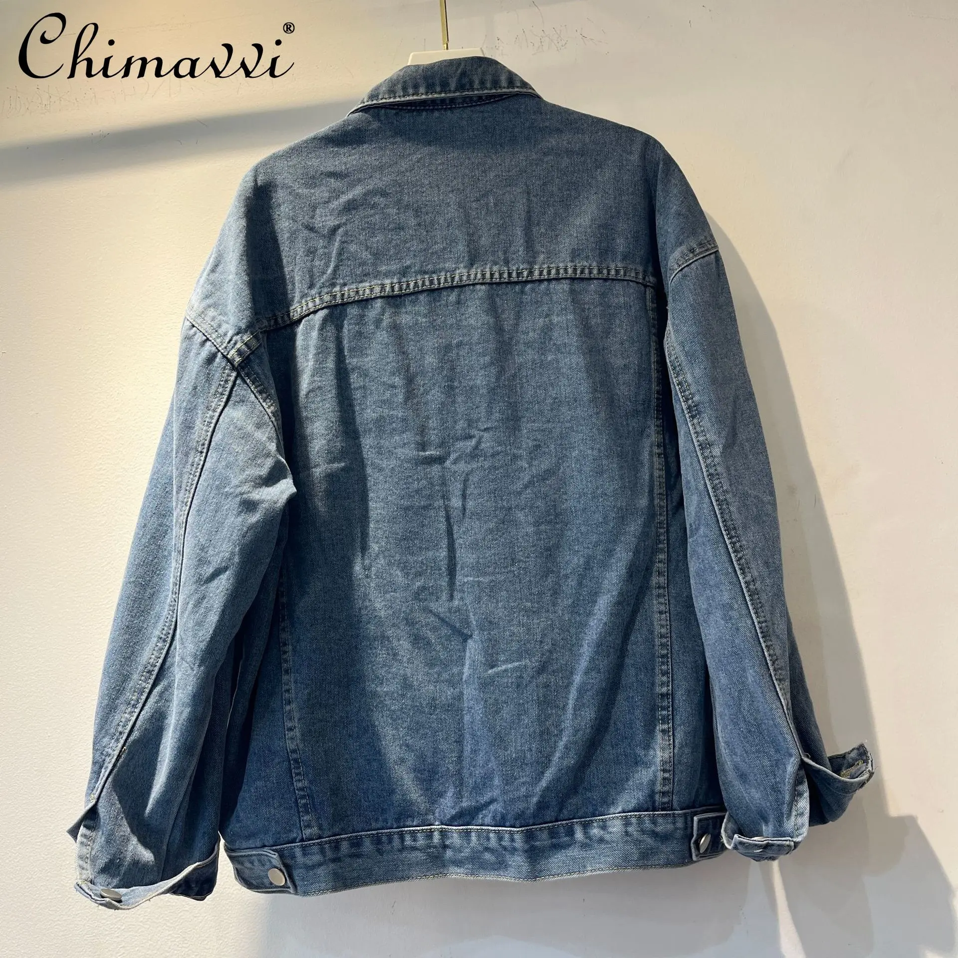 ربيع جديد الثقيلة الأزياء ريشة 3D زهرة الدنيم سترة المرأة كامل حجر الراين مطرز فضفاض كم طويل الشارع الشهير معطف أعلى