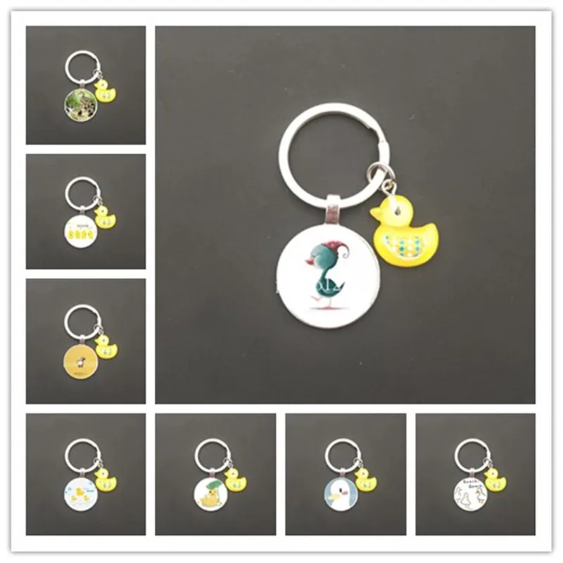 2021 new hot sale duckling keychain small yellow duck glass cabochon keychain car bag pendant love duck small gift