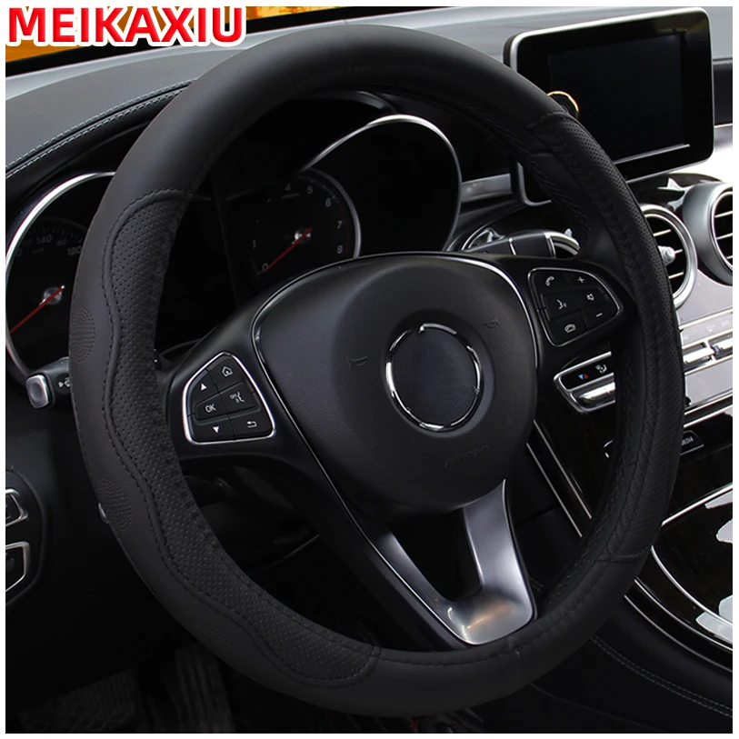 PU fiber leather embossed car has an inner ring steering wheel cover suitable for 14.5 - 15 inch round car decorations. 2