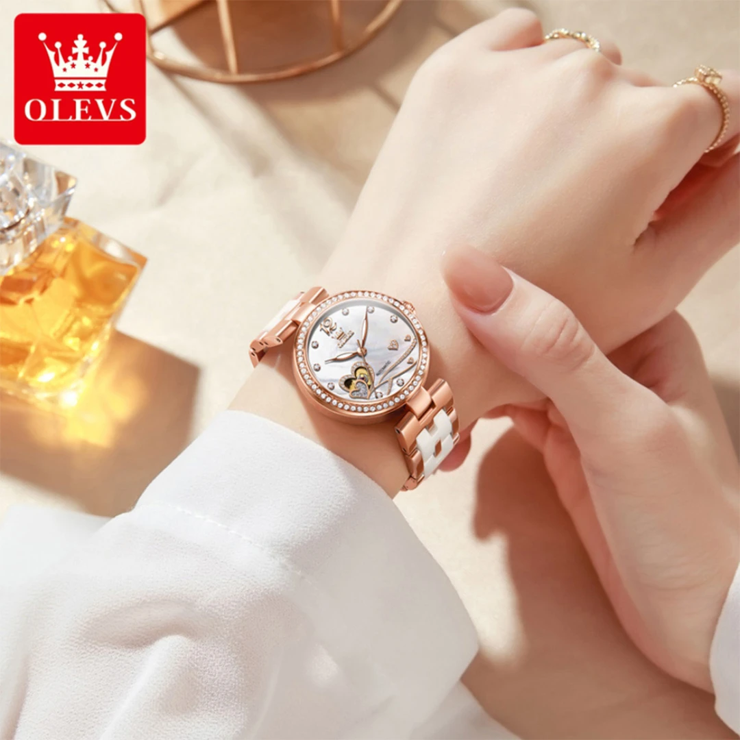 ساعة OLEVS 7086 الميكانيكية الأنيقة هدية دائرية الشكل من الفولاذ المقاوم للصدأ بسوار ساعة يد مضيئة