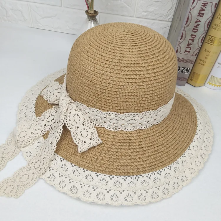 

Korean version women's lace straw hat bucket hat fashion personality beach travel bow hat straw