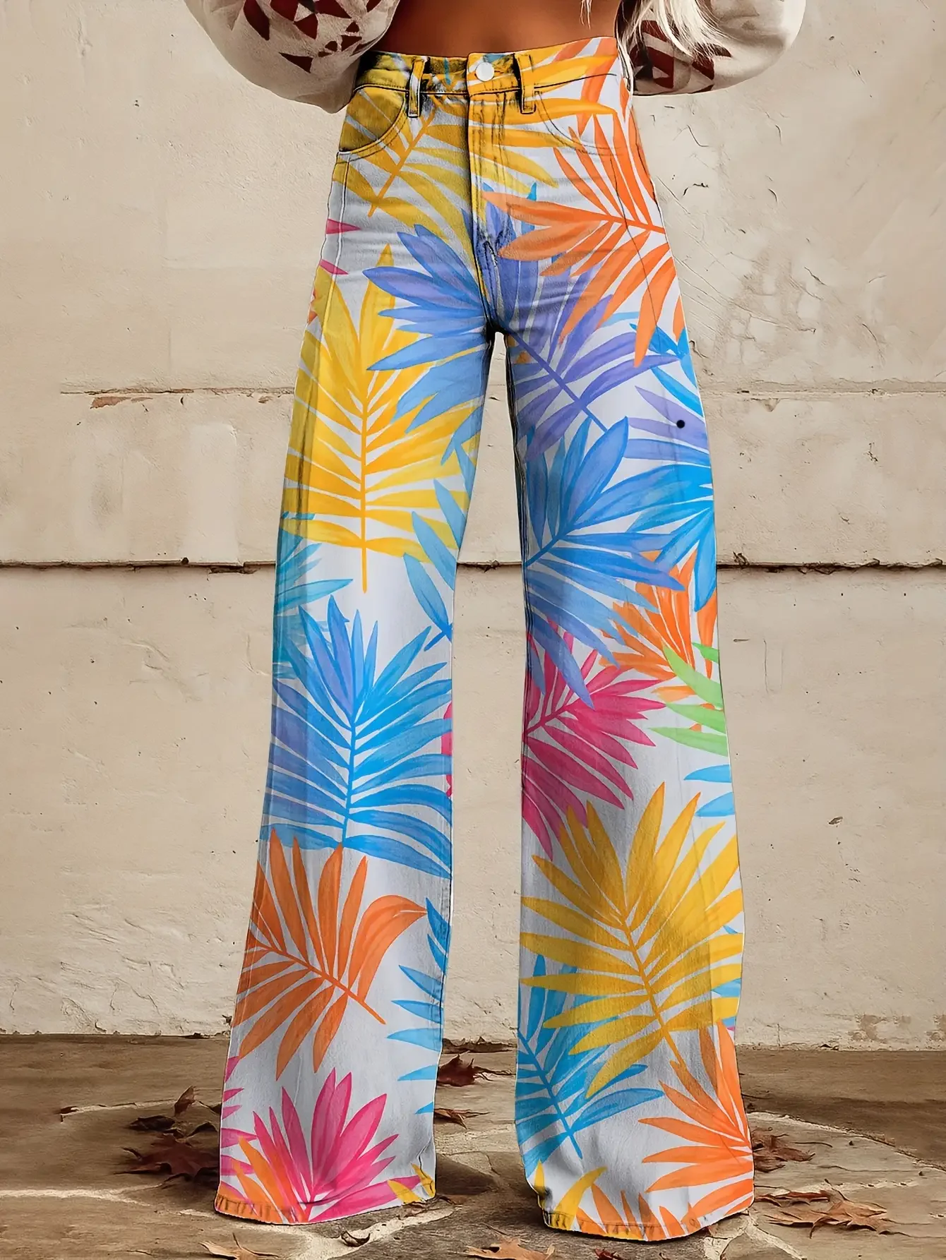  Casual jeans with a variety of colorful western prints, loose wide leg design, and fun printed women's pants