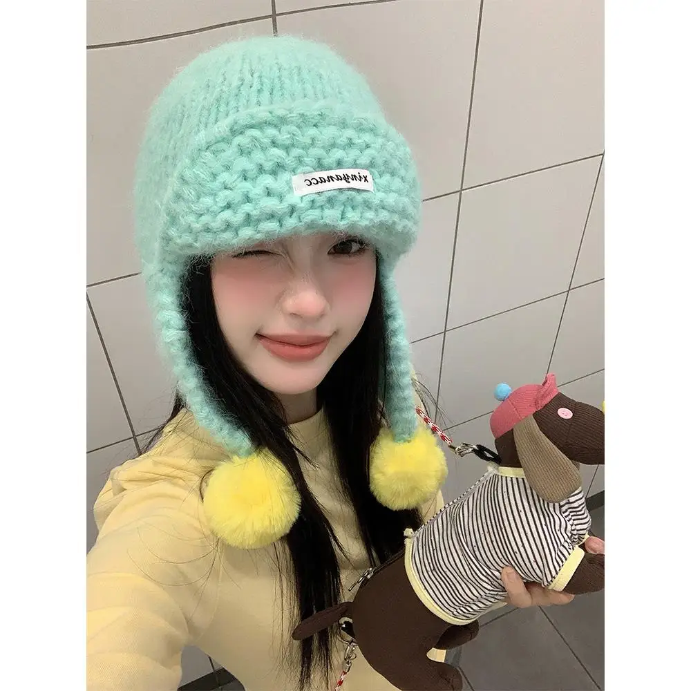 かわいいグリーンニットボール耳保護帽子女性の秋冬韓国スタイルフライングキャップ暖かい雷峰キャップファッショナブル