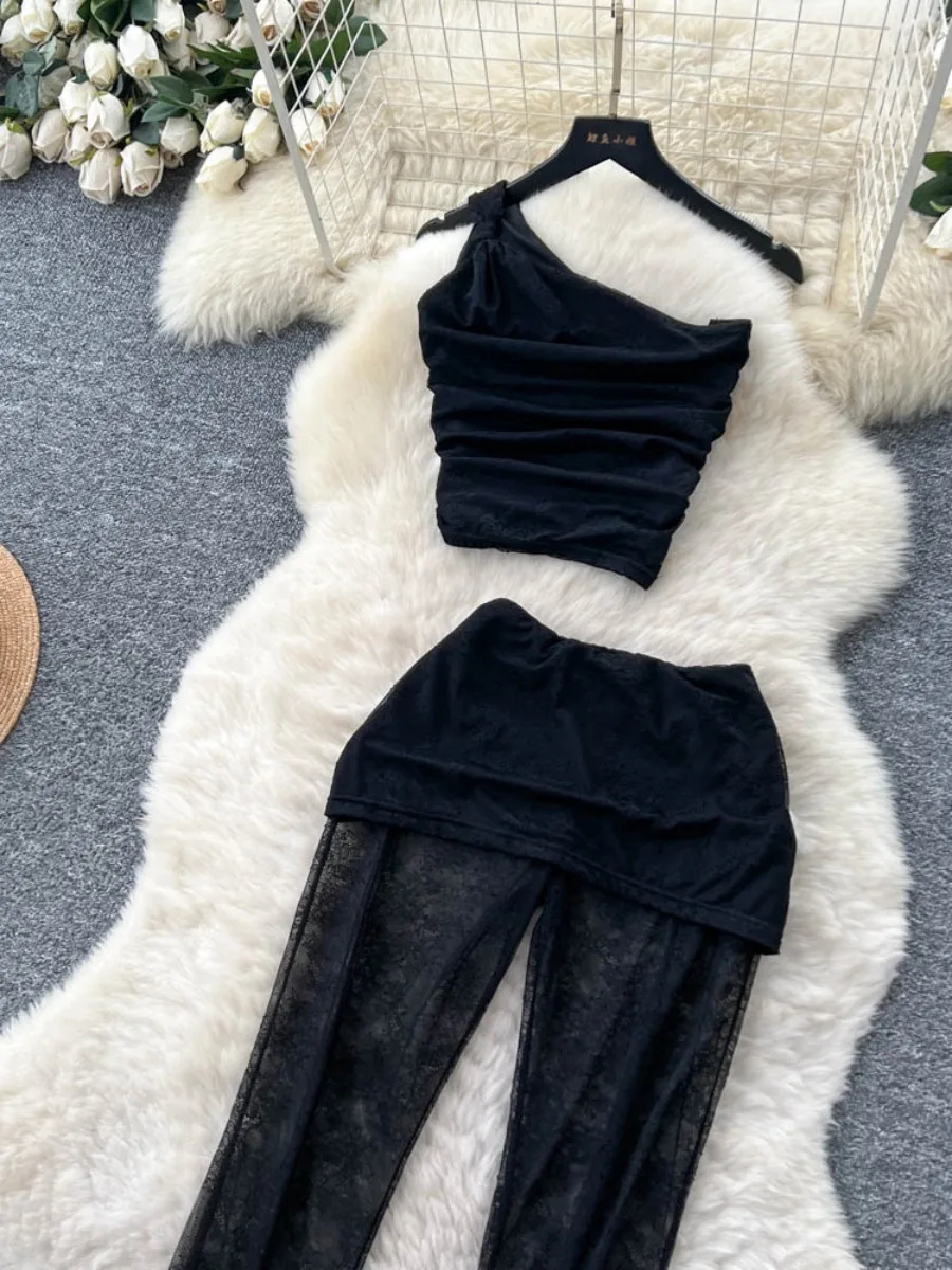 ssTss American Sexy Chaleco ajustado sin mangas con un hombro + Pantalones acampanados de encaje transparentes negros de cintura alta Conjunto de 2 piezas