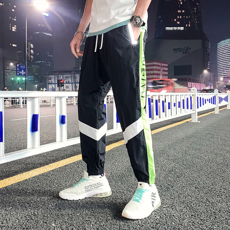 

New HOT 2023 Hot Hip Hop Reflective Beam Foot Cargo Jogger Leisure Sports Trousers Fashion Streetwear Men Pants