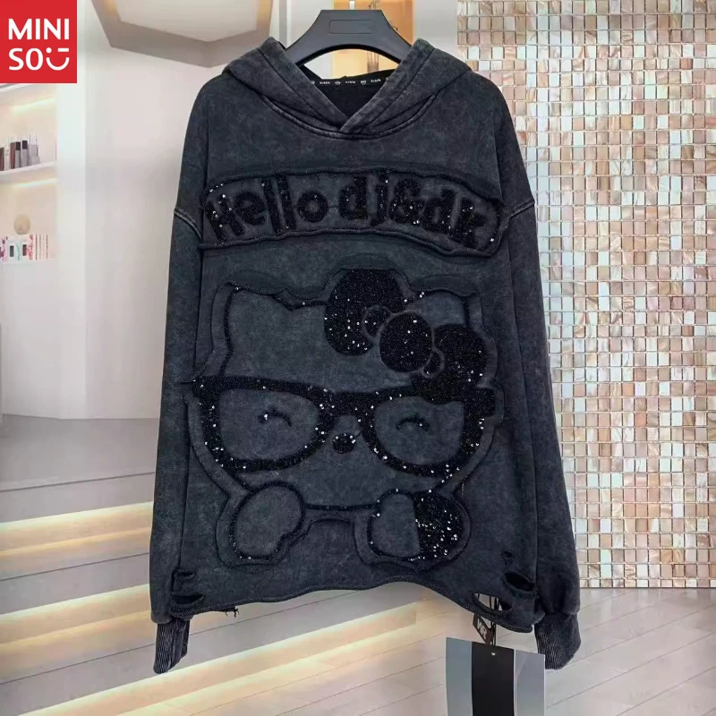 

Miniso Hello Kitty Oversized Hoodie: Heavyweight Patchwork Pullover for Petite Fashion