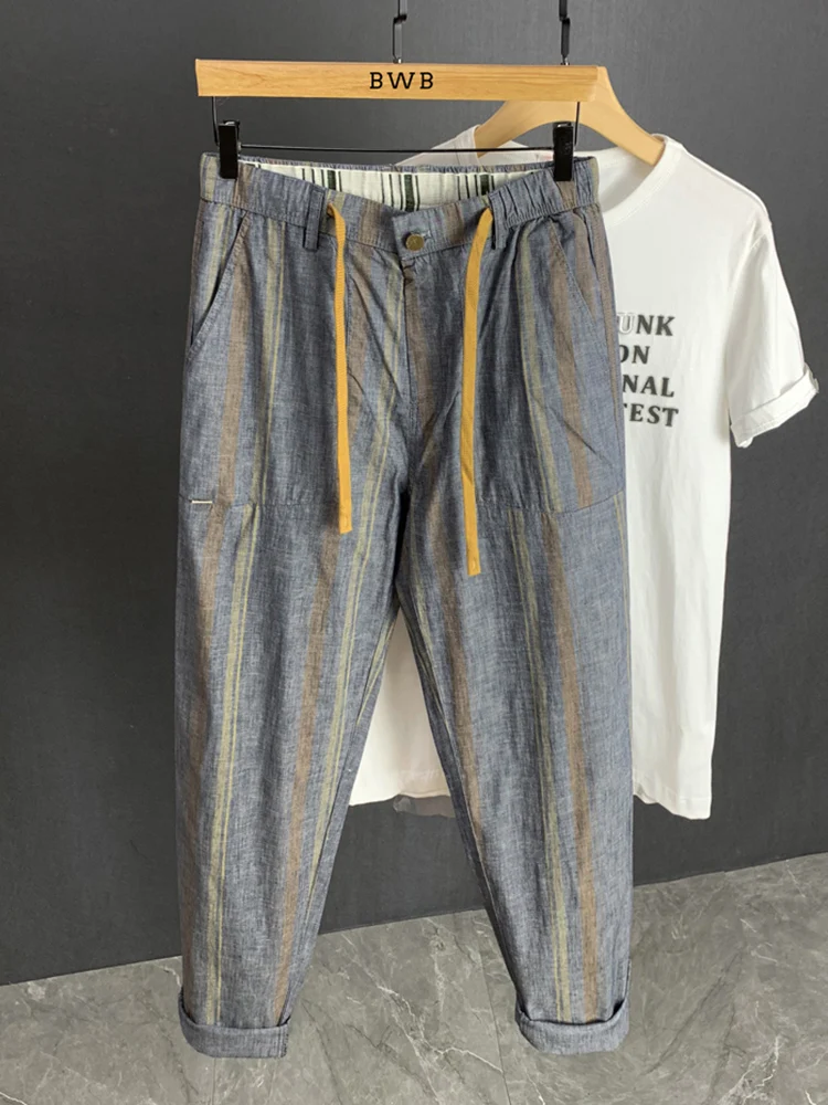 Pantaloni casual a righe di fascia alta alla moda Pantaloni larghi dritti sottili estivi Dstring Harlan giapponese Sle a nove pezzi