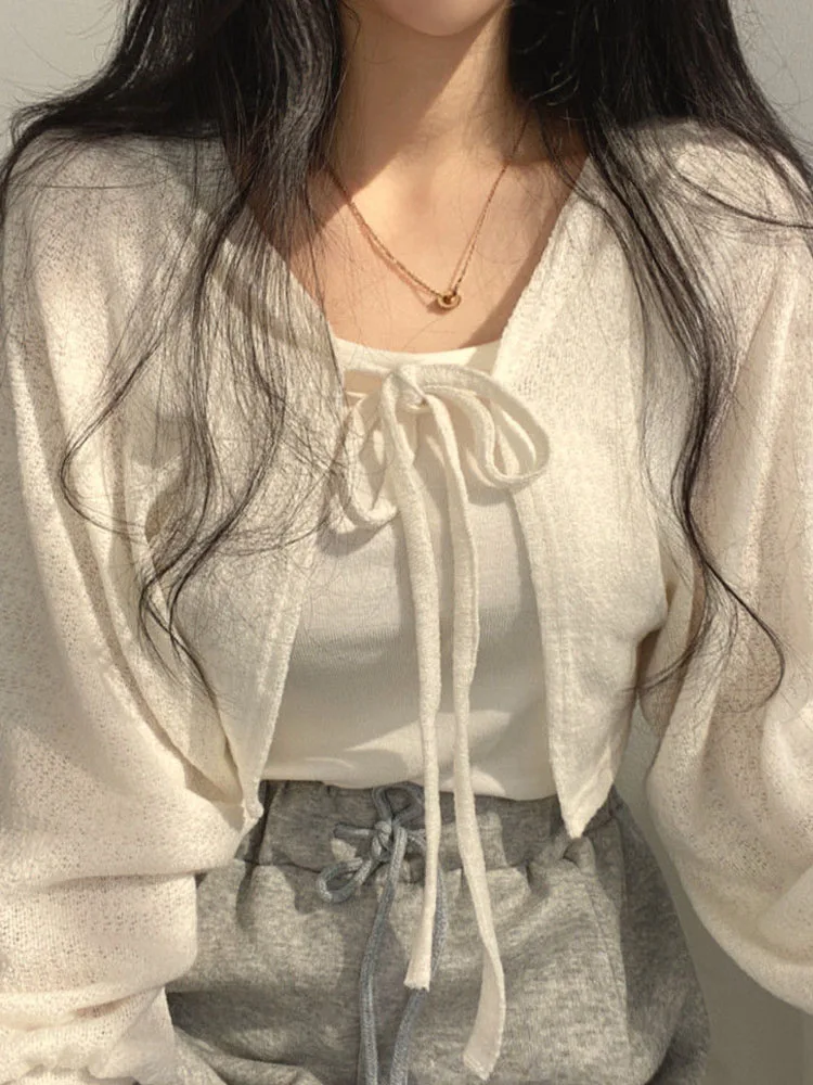 Dünne weiße Strickjacke Frauen Sommer Sonnencreme Schnür Strickwaren Tops Dame koreanischen Stil lässig Laterne Ärmel kurze sonnen geschützte Top