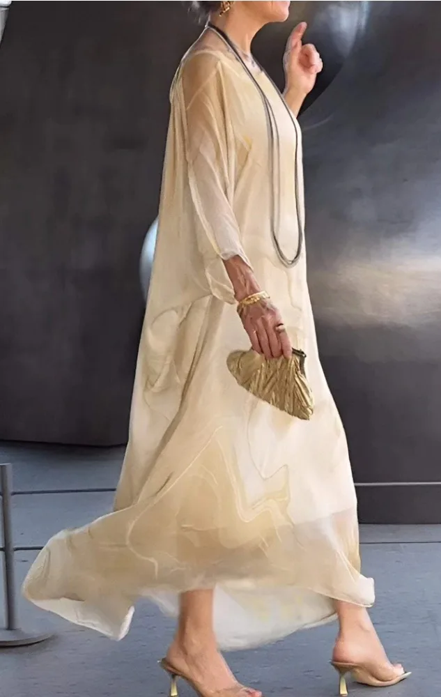 فستان نسائي لربيع وصيف 2025 جديد أنيق للتنقل من الشيفون مطبوع عليه نسيج رخامي وأكمام طويلة فساتين طويلة غير منتظمة