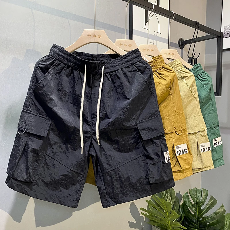 

Summer 2023 Men's Casual Loose Fit Thin Workwear orts Five-Quarter Beach Pants Breathable Straight Leg Trousers Polyester F...